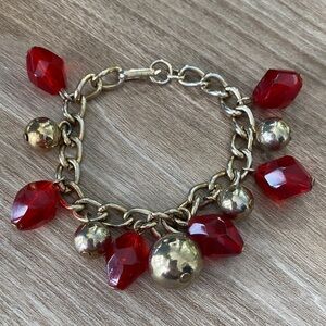 Elegant Red Beads and Gold Toned Charm Bracelet